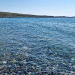 The clear waters at Stomio Beach