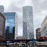 DLR in front of skyrises at Canary Wharf