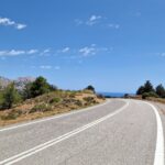 Highway leading away from the sea and into the mountains