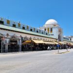 Nea Agora Marketplace with the Bank of Greece in the background