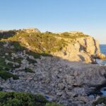 Taking a stroll near Anthony Quinn Bay